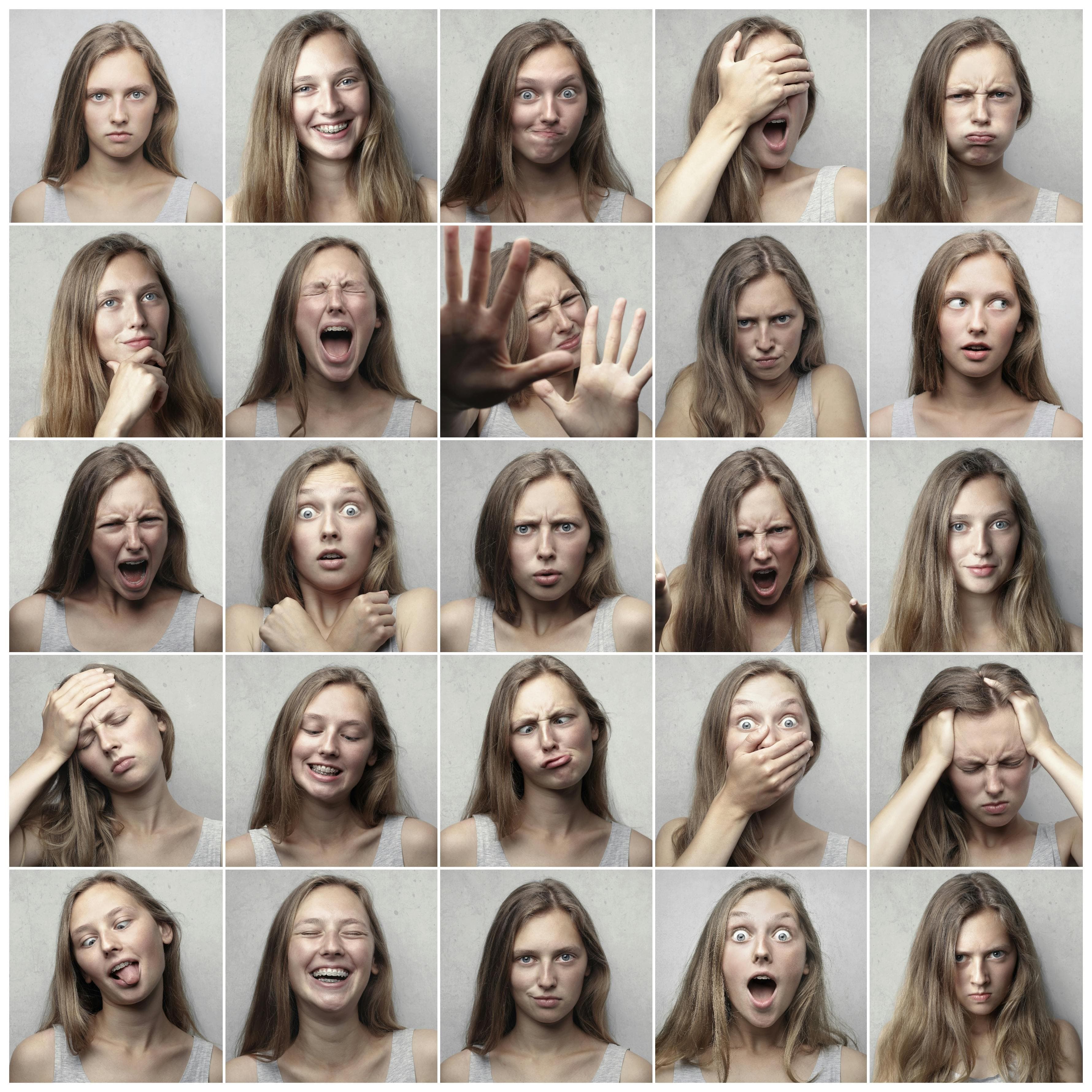 The face of a young white woman with long, dirty blonde hair repeated over-and-over again each time with a different exaggerated facial expression.