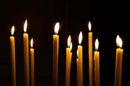 A bunch of lit up candles