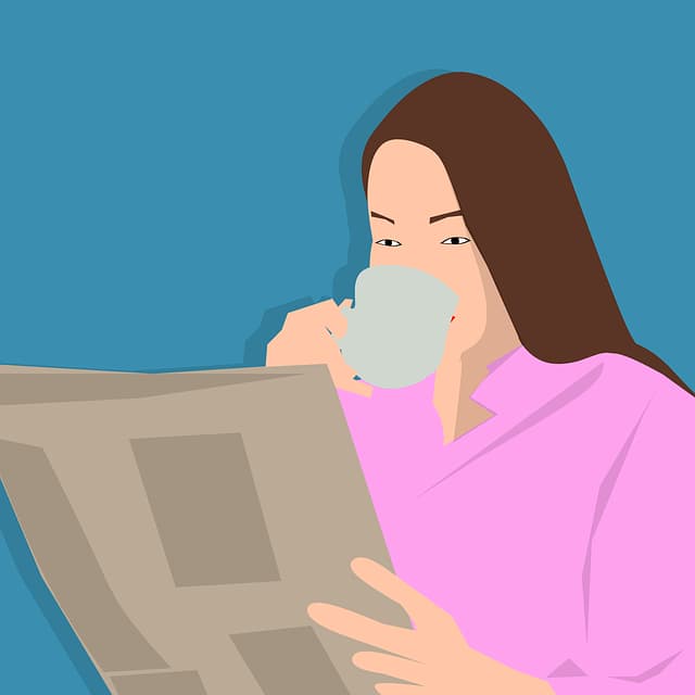 A clipart drawing of a woman reading a newspaper while she drinks coffee. She is wearing a pink collared shirt and has long straight brown hair.