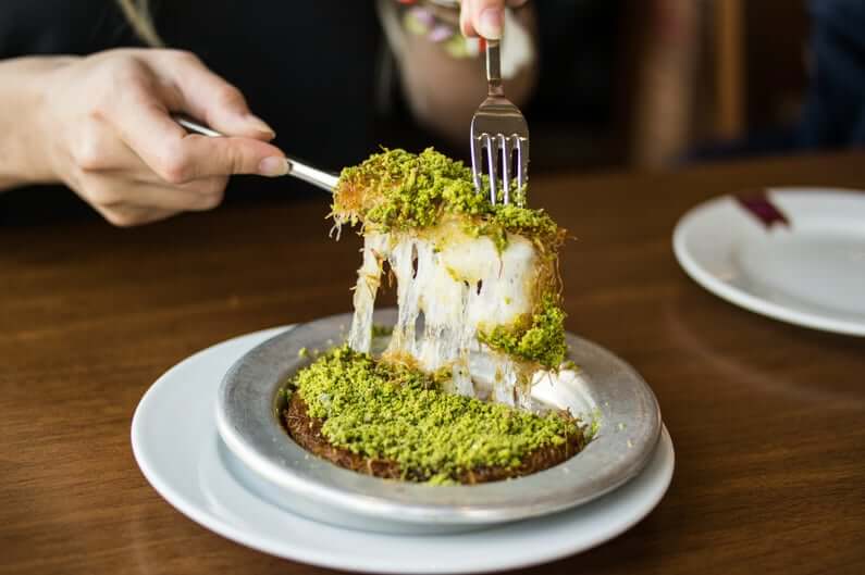 Filo pastry topped with nuts and cheese