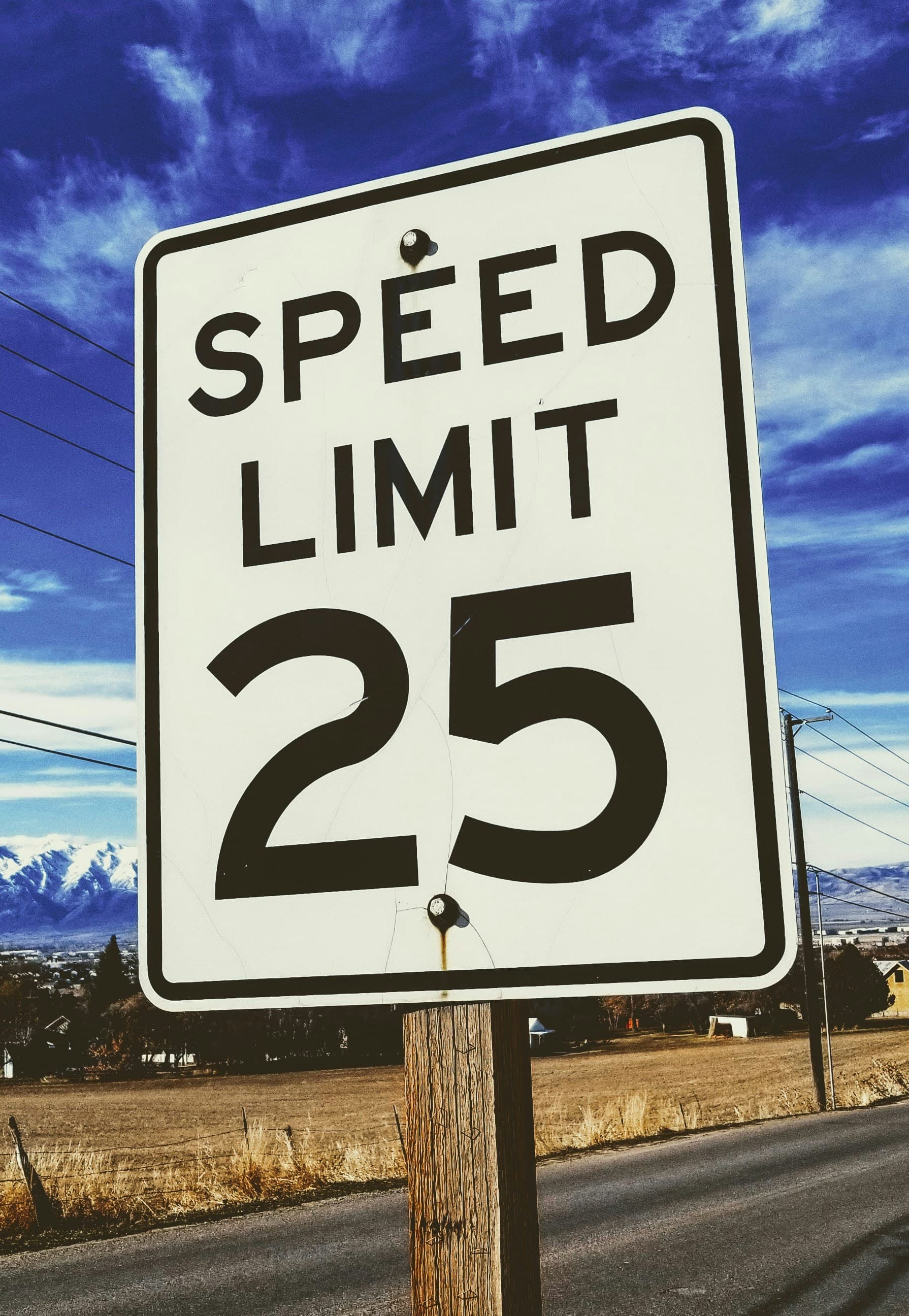 A photo of a speed limit sign reading "Speed limit 25"