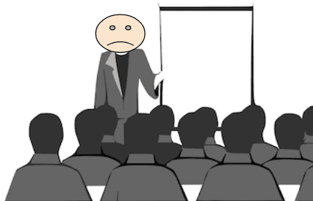 a man is giving a presentation while frowning