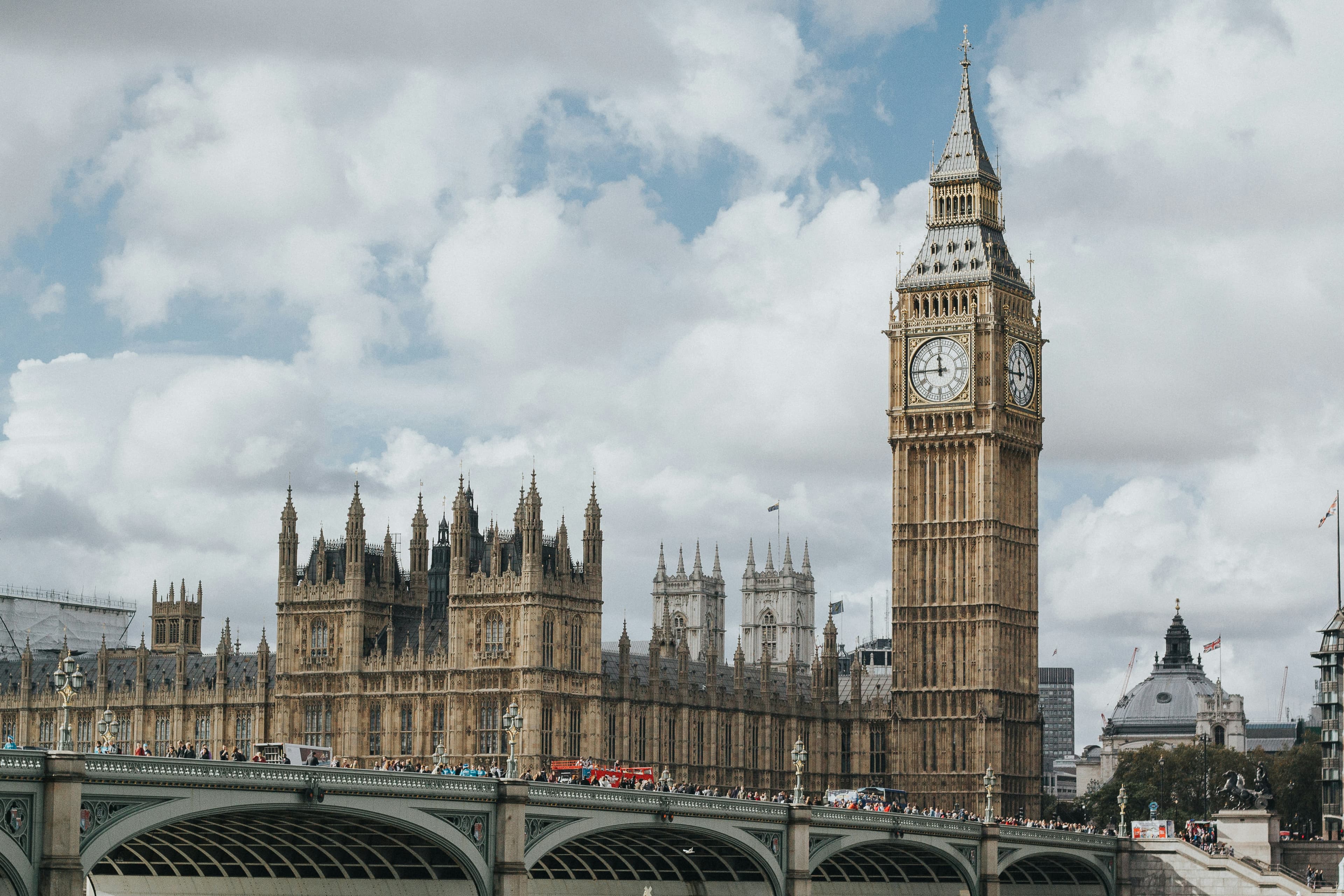 A photograph of Big Ben and the British Parliament building taken from across the river.